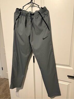 Nike Men's Gray Athletic Joggers with Black Accents